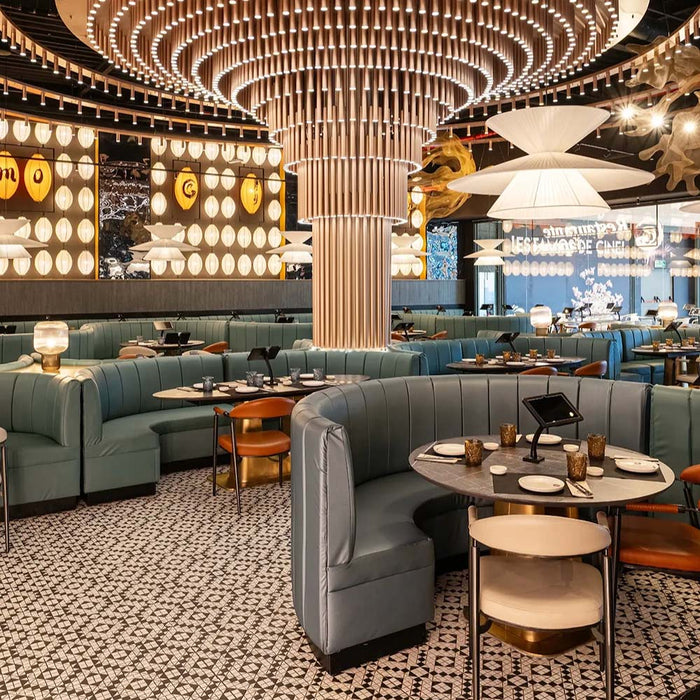 Restaurant interior featuring Abbey Black & White A 28×28cm Victorian-style patterned porcelain mosaic floor tiles.