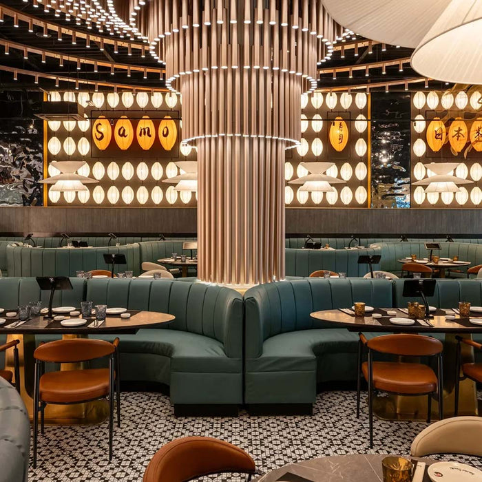 Restaurant interior featuring Abbey Black & White A 28×28cm Victorian-style patterned porcelain mosaic floor tiles.