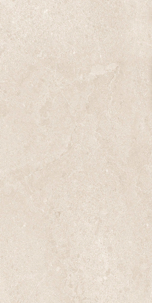 Close-up of Riad Avorio Neutra Stone 30x60cm stone-effect wall and floor tile, featuring warm ivory and beige tones with delicate natural stone-inspired veining and a subtle, elegant textured finish.