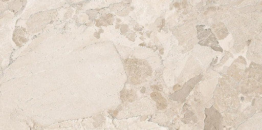 Close-up of Riad Avorio Sassi Stone 30x60cm stone-effect wall and floor tile, featuring warm ivory and beige tones with natural stone-inspired veining, subtle texture and an elegant, timeless finish.