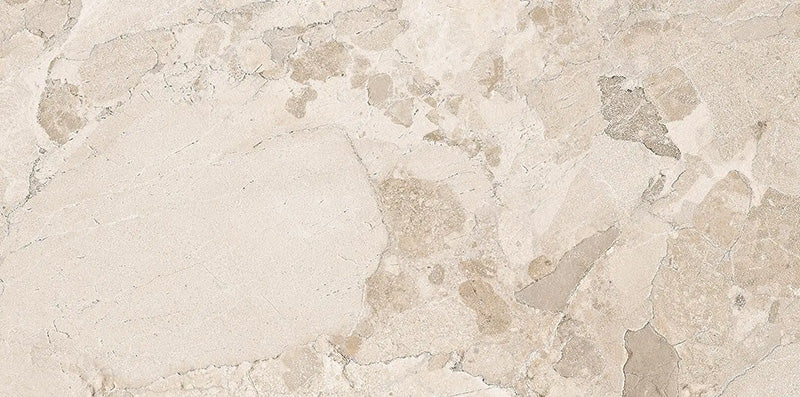 Close-up of Riad Avorio Sassi Stone 30x60cm stone-effect wall and floor tile, featuring warm ivory and beige tones with natural stone-inspired veining, subtle texture and an elegant, timeless finish.