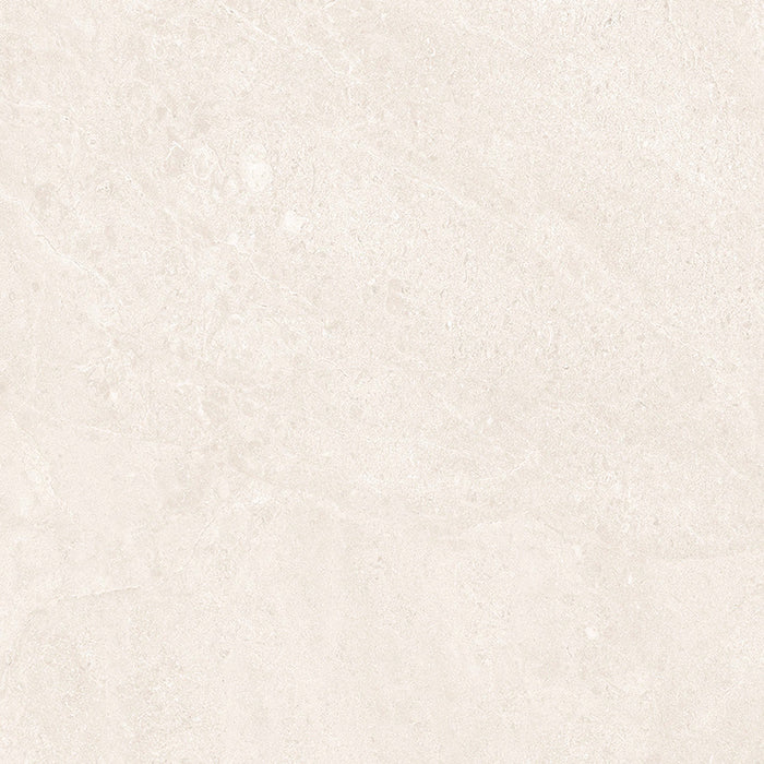 Close-up of Riad Blanco Neutra Stone 60x60cm stone-effect wall and floor tile, featuring soft cream and ivory tones with delicate natural stone-inspired veining and a subtle, elegant textured finish.
