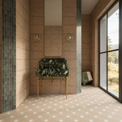 Bathroom featuring Rubins Gold Decor MINI 15x15cm Moroccan-style porcelain wall tiles, with intricate geometric patterns in warm gold and beige tones, paired with dark green marble accents, a statement marble washbasin, brass fittings and star-patterned floor tiles.