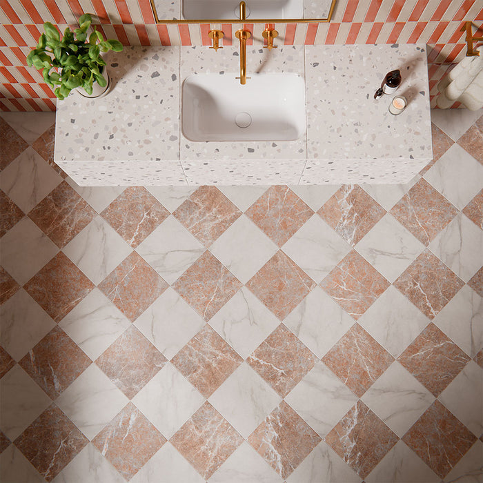 Vitoria Classic Rosso marble style chequerboard tiles in 30x30cm format used on bathroom floors, featuring warm red and white marble effect squares laid in a classic checkerboard pattern for a timeless yet bold statement interior.