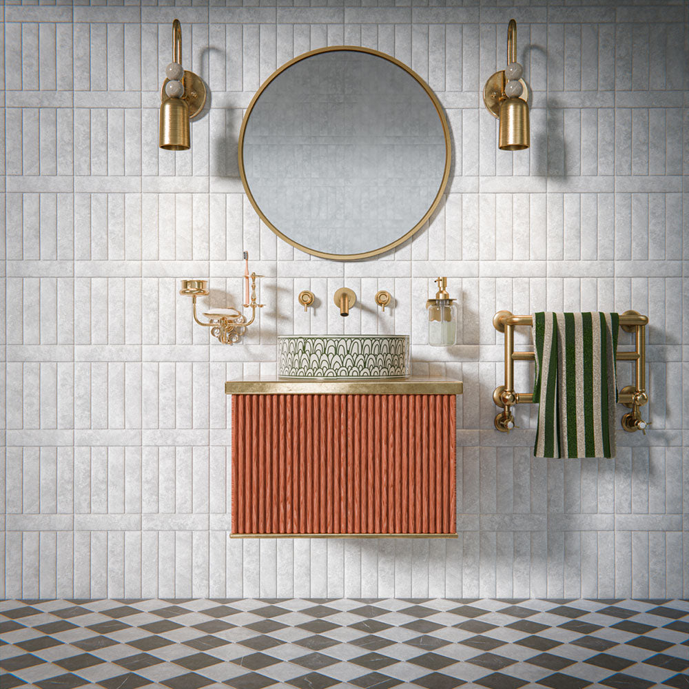 Bathroom featuring Amalfi Square Nero Vintage Marble 11x11cm wall and floor tiles, laid in a diagonal chequerboard pattern, showcasing soft grey and dark tones, paired with brass fittings, a fluted vanity unit, and a classic contemporary finish.