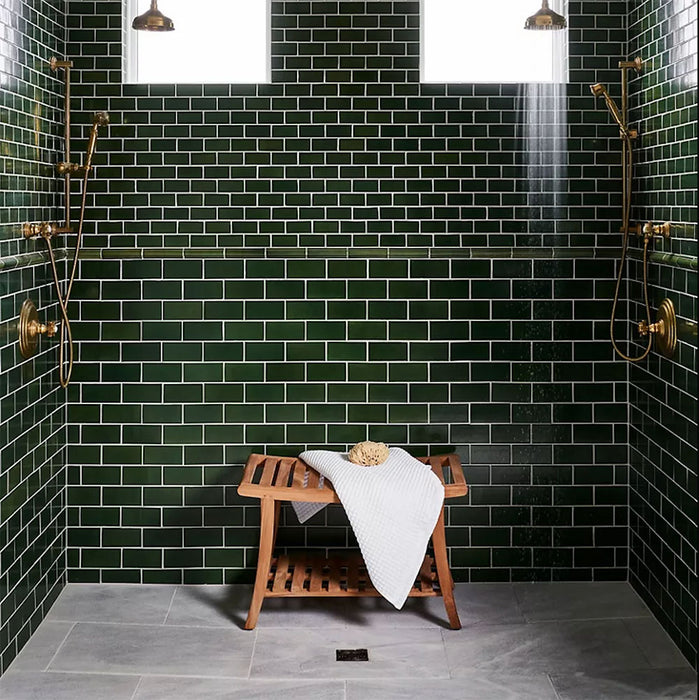 Shower room featuring Pimlico Golders Green 7.5 × 15cm ceramic wall tiles with a crackle glaze finish, laid in a classic brick pattern and paired with brass fittings for a rich, timeless look.