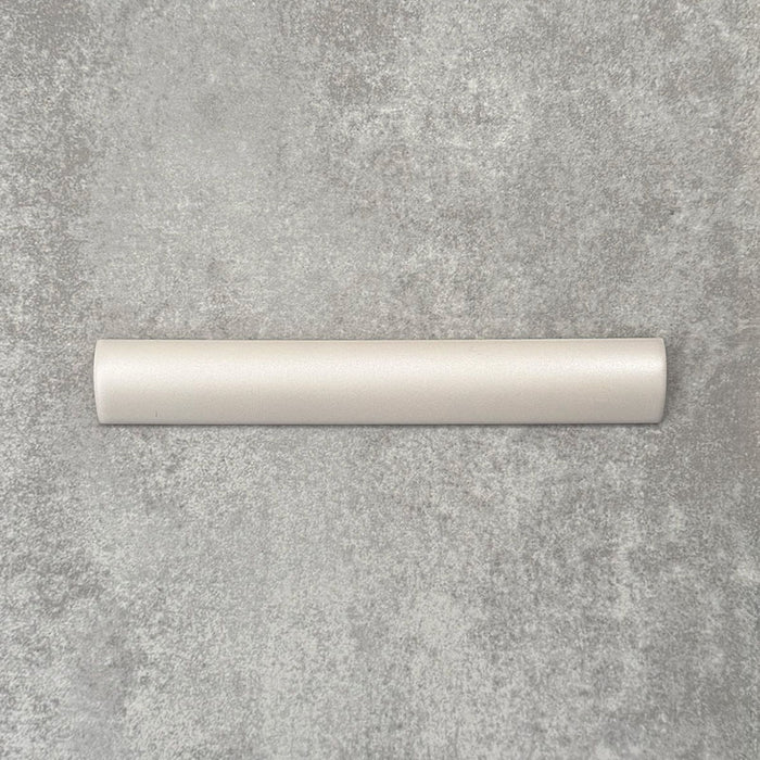 Zellige Oyster bullnose ceramic tile in a soft oyster white finish, 3 × 20 cm, shown laid flat on a neutral background.