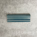 Pimlico River Blue dado trim tile measuring 5 × 15cm, finished with a crackle glaze and deep blue tone, designed to add a decorative feature line and classic detailing to ceramic wall tile installations.