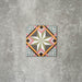 Single Cuba Star Mini Moroccan-style porcelain tile in a 15×15cm square format, featuring a geometric star motif in soft green, blue, pink and mustard tones, shown against a neutral background to highlight the tile’s crisp lines, fine detailing and decorative encaustic-style design.