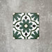 Clara Verde Victorian Moroccan-style porcelain tile in a 20 × 20cm format, shown as a single tile highlighting its bold green geometric pattern and decorative encaustic-effect design.