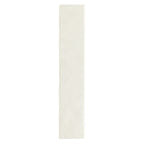 Bora Bora White Sand Brick ceramic wall tile in a 6.5 × 32.8cm slim brick format, featuring a soft white sand tone and a flux glaze finish with subtle surface variation, shown as a single tile on a white background.