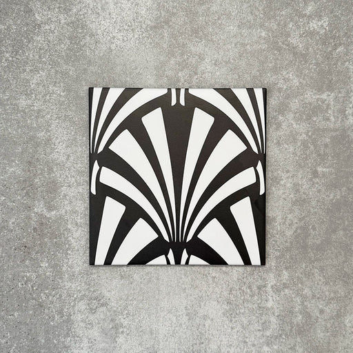 Single Almeria Casablanca Moroccan-style porcelain tile featuring a bold black and white fan pattern, 20x20cm, suitable for wall and floor use.