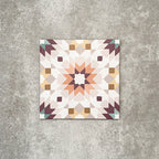 Single Cuba Manzanillo Moroccan-style porcelain tile in a 20×20cm square format, featuring a geometric star motif in soft cream, mustard, teal and burgundy tones, shown against a neutral background to highlight the tile’s crisp detailing and decorative encaustic-style design.
