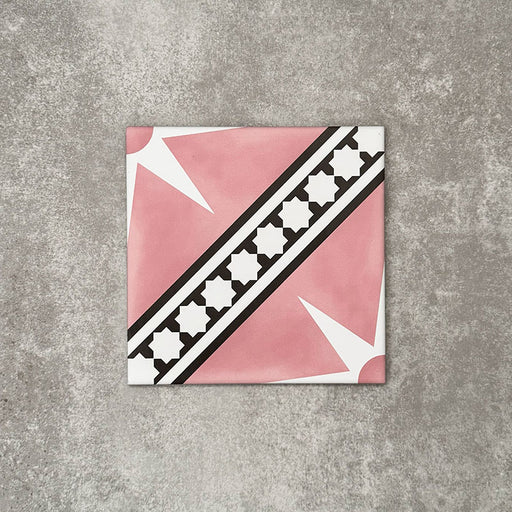 Gilgamesh Pink Moroccan style 20x20cm patterned tile, shown as a single tile highlighting the pink, black and white geometric star design.