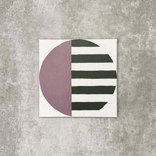 Single Abstract Serit Patterned Tile in a 20x20cm format, featuring a bold geometric design with a soft pink semicircle contrasted by deep green horizontal stripes on a crisp white background. A contemporary patterned tile ideal for feature walls, floors or statement splashbacks.
