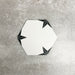 Single Polaris Black Star Hexagon Moroccan-style porcelain tile in a 22 × 25cm format, featuring a white hexagonal base with black star detailing, shown on a neutral background to highlight the geometric design suitable for wall and floor use.
