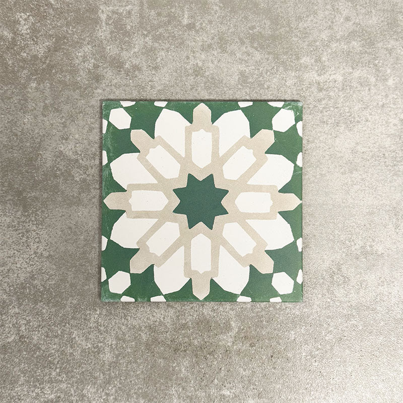 Souk Green D 20×20cm Moroccan-style porcelain tile with a green, white and beige geometric pattern.