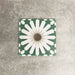 Souk Green B 20×20cm Moroccan-style porcelain tile with a green, white and beige geometric pattern.