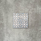 Berber Tetuan Blue 15×15cm Moroccan-style porcelain tile featuring a soft blue and cream geometric pattern on a neutral background.