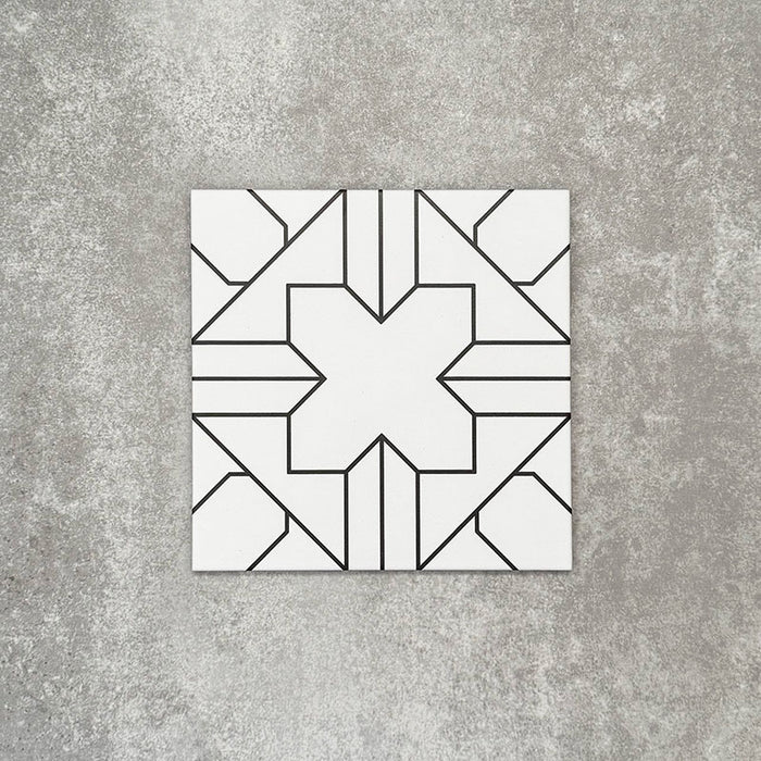 Single Almeria Palace Moroccan-style porcelain tile featuring a refined black line geometric pattern on a white base, 20x20cm, suitable for wall and floor use.