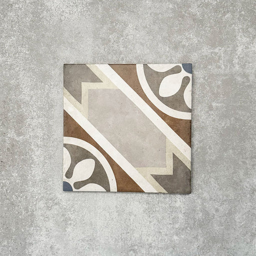 Viscount Heythrop 20×20cm Victorian-style porcelain wall and floor tile featuring a geometric and floral-inspired pattern in soft grey, warm beige, taupe and muted blue tones, photographed as a single tile on a neutral grey background.
