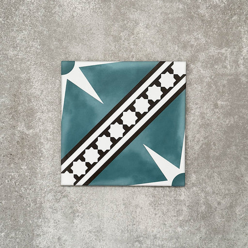 Gilgamesh Blue Moroccan style 20x20cm patterned tile, shown as a single tile highlighting the blue, black and white geometric star design.