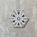 Single Medina Hormuz Sage Green/Grey Moroccan-style hexagon porcelain tile, 18.7 × 21.6 cm, featuring a bold star-inspired geometric pattern in sage green, grey and white tones on a neutral background.