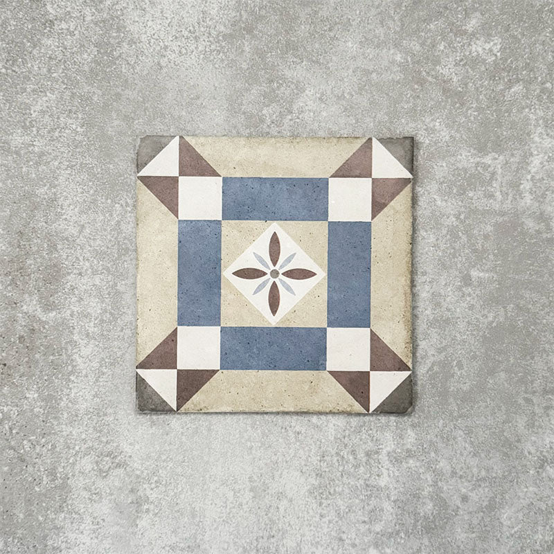 Viscount Harley Street 20×20cm Victorian-style porcelain wall and floor tile featuring a geometric square and floral motif in soft blue, beige, warm grey and white tones, photographed as a single tile on a neutral grey background.