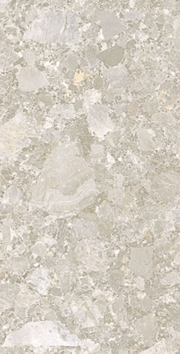 Close-up of Essentials Terrazzo Stone Avorio 60x120cm terrazzo effect porcelain tile, showcasing soft beige and ivory tones with varied stone fragments and a natural, blended surface design.