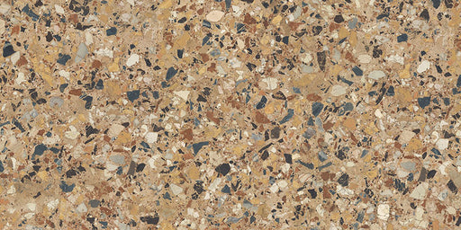 Close-up of the Stuzzi Amber 60x120cm terrazzo style porcelain tile, featuring a warm amber-toned base with a blend of large and small stone fragments in cream, ochre, rust, charcoal and soft grey. The realistic 4D brushed finish enhances the depth and texture, creating an authentic terrazzo effect.