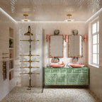 Luxury bathroom featuring Stuzzi Amber 60x60cm classical terrazzo style porcelain floor tiles with a 4D brushed finish, paired with soft blush gloss wall tiles, a sage green vanity unit, pink basins, brushed brass fittings and vintage-inspired details.
