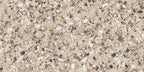 Close-up of the Stuzzi Dolmia 60x120cm terrazzo style porcelain tile, featuring a warm beige base with a blend of cream, taupe, brown, grey and charcoal stone fragments. The realistic 4D brushed finish enhances the texture and depth, creating an authentic terrazzo effect.
