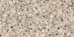 Close-up of the Stuzzi Dolmia 60x120cm terrazzo style porcelain tile, featuring a warm beige base with a blend of cream, taupe, brown, grey and charcoal stone fragments. The realistic 4D brushed finish enhances the texture and depth, creating an authentic terrazzo effect.