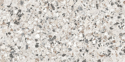 Close-up of the Stuzzi Lunar 60x120cm terrazzo style porcelain tile, featuring a soft light grey base with a blend of white, silver, charcoal and taupe stone fragments. The realistic 4D brushed finish enhances the texture and depth, creating an authentic terrazzo effect.