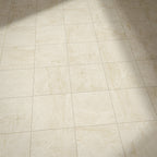 Floor setting featuring Divine Taj Mahal Matt Marble effect 30 × 30cm porcelain tiles, laid in a grid layout, showcasing soft beige tones, subtle veining, and a natural stone-inspired matt finish.