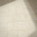 Floor setting featuring Divine Taj Mahal Matt Marble effect 30 × 30cm porcelain tiles, laid in a grid layout, showcasing soft beige tones, subtle veining, and a natural stone-inspired matt finish.