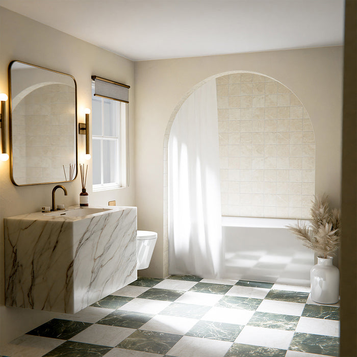 Bathroom interior featuring Divine Taj Mahal Matt Marble effect 30 × 30cm porcelain floor tiles in a chequerboard layout, styled with a marble vanity, freestanding bath, and soft neutral tones with natural light.