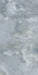 Close-up of Thebes Blue Honed Matt Onyx 60x120cm porcelain tile featuring soft blue onyx-effect veining with layered white, grey and pale blue tones. The honed matt finish creates a luxurious natural stone look, perfect for bathroom walls, feature walls and elegant interiors.