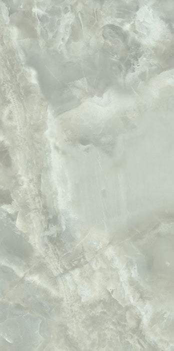 Close-up of Thebes Green Honed Matt Onyx 60x120cm porcelain tile featuring soft green onyx-effect veining with cloudy white and pale sage tones. The honed matt finish creates a natural stone look, ideal for bathroom walls, feature walls and luxurious interior spaces.