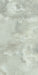 Close-up of Thebes Green Honed Matt Onyx 60x120cm porcelain tile featuring soft green onyx-effect veining with cloudy white and pale sage tones. The honed matt finish creates a natural stone look, ideal for bathroom walls, feature walls and luxurious interior spaces.