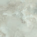 Close-up of Thebes Green Honed Matt Onyx 60x60cm porcelain tile featuring soft green onyx-effect veining with cloudy white and pale sage tones. The honed matt finish creates a natural stone look, ideal for bathroom walls, feature walls and luxurious interior spaces.