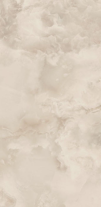 Close-up of Thebes Ivory Honed Matt Onyx 60x120cm porcelain tile featuring soft ivory onyx-effect veining with warm cream, beige and subtle golden tones. The honed matt finish creates a luxurious natural stone look, ideal for bathroom walls, feature walls and elegant interior spaces.