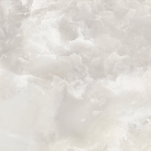 Close-up of Thebes White honed matt onyx effect porcelain tile in a 60cm x 60cm format, showcasing soft ivory and warm beige tones with delicate translucent veining and a realistic natural onyx effect finish.