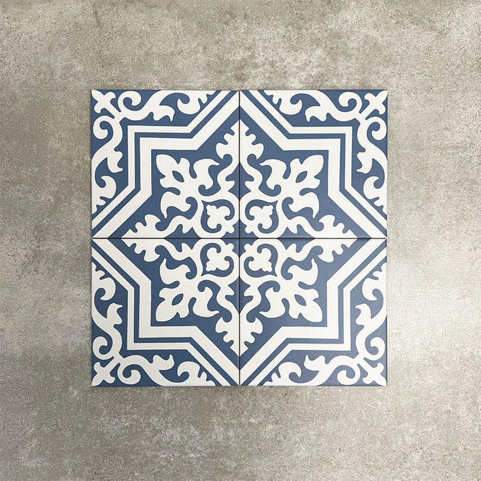 Four London Streets Thornton Place 20x20cm Victorian Moroccan style porcelain tiles arranged together to showcase the repeating blue and white geometric pattern inspired by traditional Victorian style decorative floor tiles.