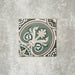 Regent Street 20cm x 20cm Victorian style ceramic tile, featuring an ornate green, cream and grey heritage pattern inspired by traditional encaustic floor tiles.
