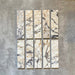 Set of Fayrouz Picasso 5x20cm natural marble tiles with a honed finish, displaying a white base with expressive grey, green and warm gold veining, showcasing natural tonal variation and unique patterning across individual pieces.