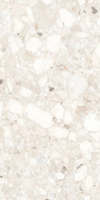 Close-up of Venice Ivory matt terrazzo effect 2cm porcelain paving in a 60 x 120cm format, featuring soft ivory stone fragments and an anti-slip finish for stylish outdoor patios, terraces and garden spaces.