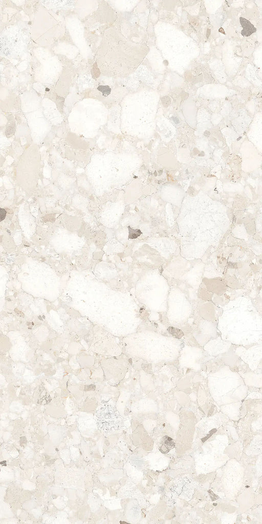 Close-up of Venice Ivory matt terrazzo effect 2cm porcelain paving in a 60 x 120cm format, featuring soft ivory stone fragments and an anti-slip finish for stylish outdoor patios, terraces and garden spaces.