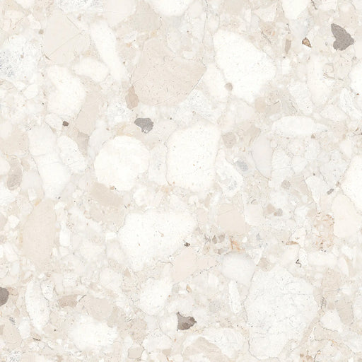 Close-up of Venice Ivory polished terrazzo effect porcelain tile, featuring soft ivory and cream tones with natural stone chips and a polished finish, ideal for luxurious kitchen, bathroom and living room walls and floors.