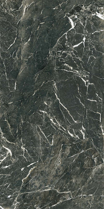 Close-up of Verde Apia Polished Green Marble effect 60 × 120cm porcelain tile, showcasing deep green tones with fine white veining, high-gloss finish, and natural stone-inspired pattern variation.